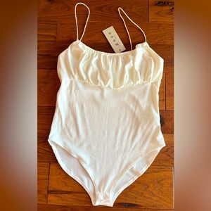 Gaze cream bodysuit size medium NWT